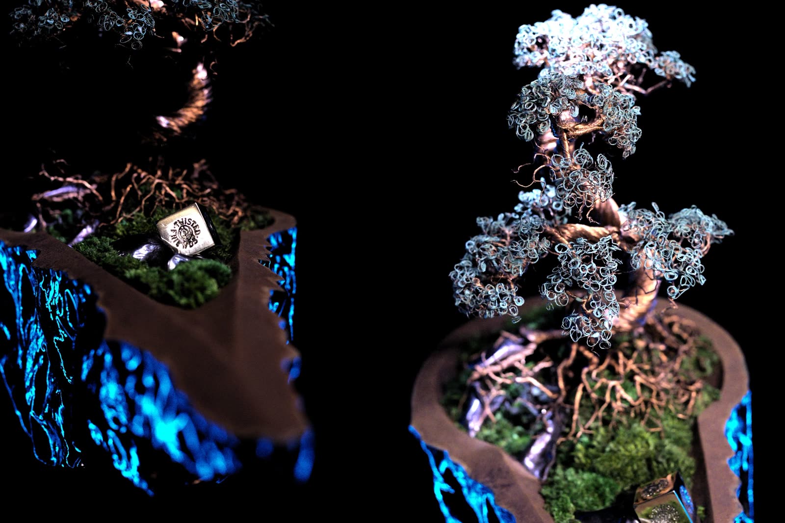 Two Worlds, metal sculpture by Twisted Friends