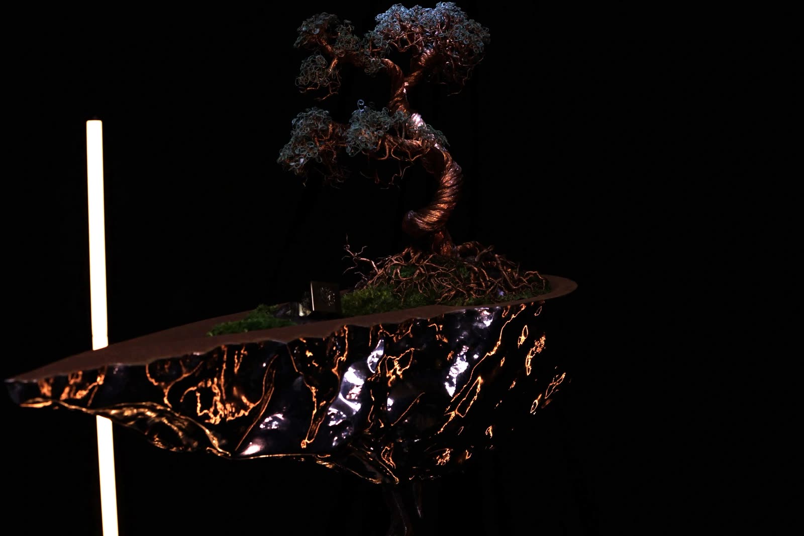 Suspended Isle, metal sculpture by Twisted Friends